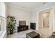 Office space showcasing neutral walls, a console table, and an open doorway to the main entryway at 10128 Morning Mist Ln, Sarasota, FL 34241