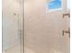 Modern bathroom with a large walk-in shower at 10128 Morning Mist Ln, Sarasota, FL 34241