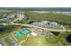 Aerial view of community amenities including pool and tennis courts at 10128 Morning Mist Ln, Sarasota, FL 34241