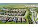 Aerial view of a large community with houses and green spaces at 10128 Morning Mist Ln, Sarasota, FL 34241