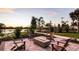 Community fire pit with comfortable seating at 10128 Morning Mist Ln, Sarasota, FL 34241