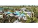 Relaxing pool area with spa, lounge chairs, and shaded seating at 10128 Morning Mist Ln, Sarasota, FL 34241