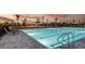 Refreshing lap pool with plenty of lounge chairs at 10128 Morning Mist Ln, Sarasota, FL 34241