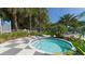 Relax in this community hot tub, featuring a checkered tile deck at 12797 Palatka Dr, Venice, FL 34293