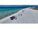 Drone view of Siesta Key Beach, showcasing white sand and clear water at 1648 Idle Ln, Sarasota, FL 34231