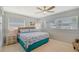 Bright bedroom with a king-size bed and coastal bedding at 1648 Idle Ln, Sarasota, FL 34231