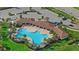 Resort-style community pool with a large covered patio area at 17015 Harvest Moon Way, Bradenton, FL 34211