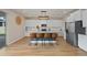 Modern kitchen with white cabinets, granite countertops and large island at 17015 Harvest Moon Way, Bradenton, FL 34211