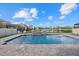 Spacious pool with patio and lake view in backyard at 17015 Harvest Moon Way, Bradenton, FL 34211