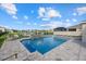 Inviting pool with water features and patio furniture at 17015 Harvest Moon Way, Bradenton, FL 34211