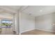 Bright and airy office space with wood-look floors and view of backyard pool at 17015 Harvest Moon Way, Bradenton, FL 34211
