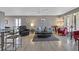 Condo living room with laminate floors and comfortable seating at 208 Lewis Cir # 4A, Punta Gorda, FL 33950