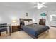 Serene bedroom with a king-size bed, nightstands, and a work area at 208 Lewis Cir # 4A, Punta Gorda, FL 33950