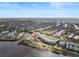 Aerial view of waterfront community with multiple buildings and boat slips at 208 Lewis Cir # 4A, Punta Gorda, FL 33950