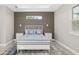 Comfortable bedroom with stylish decor, neutral walls, and an abundance of natural light at 2129 Lorraine Dr, Port Charlotte, FL 33953