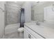 Clean bathroom with a shower/tub combo and vanity at 225 Daylily Blvd, Nokomis, FL 34275