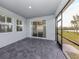 Screened patio with paver floor and backyard access at 225 Daylily Blvd, Nokomis, FL 34275