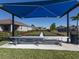 Bocce ball court with covered seating area at 225 Daylily Blvd, Nokomis, FL 34275