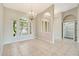 Elegant dining room with hardwood floors and chandelier at 246 Petrel Trl, Bradenton, FL 34212