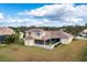 Two-story house with screened porch and large backyard at 246 Petrel Trl, Bradenton, FL 34212