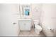 Simple bathroom with toilet and vanity at 3532 Lake Bayshore Dr # K117, Bradenton, FL 34205