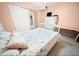 Bedroom with a queen-size bed and ample closet space at 3532 Lake Bayshore Dr # K117, Bradenton, FL 34205