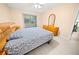 Bedroom with a queen-size bed and ensuite access at 3532 Lake Bayshore Dr # K117, Bradenton, FL 34205