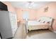 Spacious bedroom with a queen-size bed and dresser at 3532 Lake Bayshore Dr # K117, Bradenton, FL 34205