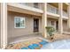 Condo building exterior showcasing entrance and landscaping at 3532 Lake Bayshore Dr # K117, Bradenton, FL 34205