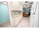 Additional kitchen counter space with storage and view to dining area at 3532 Lake Bayshore Dr # K117, Bradenton, FL 34205