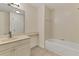 Bathroom with single vanity, mirror and bathtub at 4208 Central Sarasota Pkwy # 1417, Sarasota, FL 34238