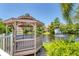 Relaxing gazebo overlooking a tranquil lake with fountain at 4208 Central Sarasota Pkwy # 1417, Sarasota, FL 34238