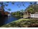 Community gazebo with lake view and lush landscaping at 4208 Central Sarasota Pkwy # 1417, Sarasota, FL 34238