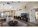 Living room with built-in shelving and hardwood floors at 4904 Linsey Ct, Sarasota, FL 34243