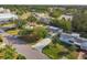 Aerial view showing a single-story home with a pool and solar panels at 5010 8Th N Ave, St Petersburg, FL 33710