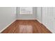 Bright bedroom featuring hardwood floors and neutral walls at 5010 8Th N Ave, St Petersburg, FL 33710