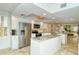 Modern kitchen with island, stainless steel appliances, and granite counters at 5770 Midnight Pass Rd # 301, Sarasota, FL 34242