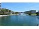 Serene pond with fountain and building views at 5770 Midnight Pass Rd # 301, Sarasota, FL 34242