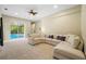 Bright Gathering room with a comfortable sectional sofa and access to the pool at 6223 90Th Avenue E Cir, Parrish, FL 34219