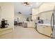 Open kitchen featuring white cabinets and stainless steel appliances at 6223 90Th Avenue E Cir, Parrish, FL 34219