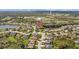 Aerial view of home nestled in a community near water and green spaces at 6223 90Th Avenue E Cir, Parrish, FL 34219