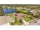 Aerial view showcasing a single-Gathering home's location within a residential community at 6223 90Th Avenue E Cir, Parrish, FL 34219