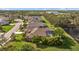 Aerial view of house nestled in a community by a lake at 6223 90Th Avenue E Cir, Parrish, FL 34219