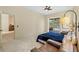Guest bedroom with direct access to the pool area at 6223 90Th Avenue E Cir, Parrish, FL 34219