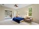 Main bedroom with pool view, sliding glass doors, and comfortable seating at 6223 90Th Avenue E Cir, Parrish, FL 34219