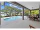 Large screened pool and patio with outdoor dining area at 6223 90Th Avenue E Cir, Parrish, FL 34219