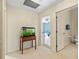 Home hallway featuring a fish tank and access to bedrooms and bathroom at 6223 90Th Avenue E Cir, Parrish, FL 34219