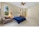 Relaxing bedroom with a comfortable bed and two armchairs at 6223 90Th Avenue E Cir, Parrish, FL 34219