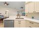 Modern kitchen with white cabinets and quartz countertops at 6223 90Th Avenue E Cir, Parrish, FL 34219