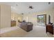 Open living room with sliding doors to pool area and neutral decor at 6223 90Th Avenue E Cir, Parrish, FL 34219